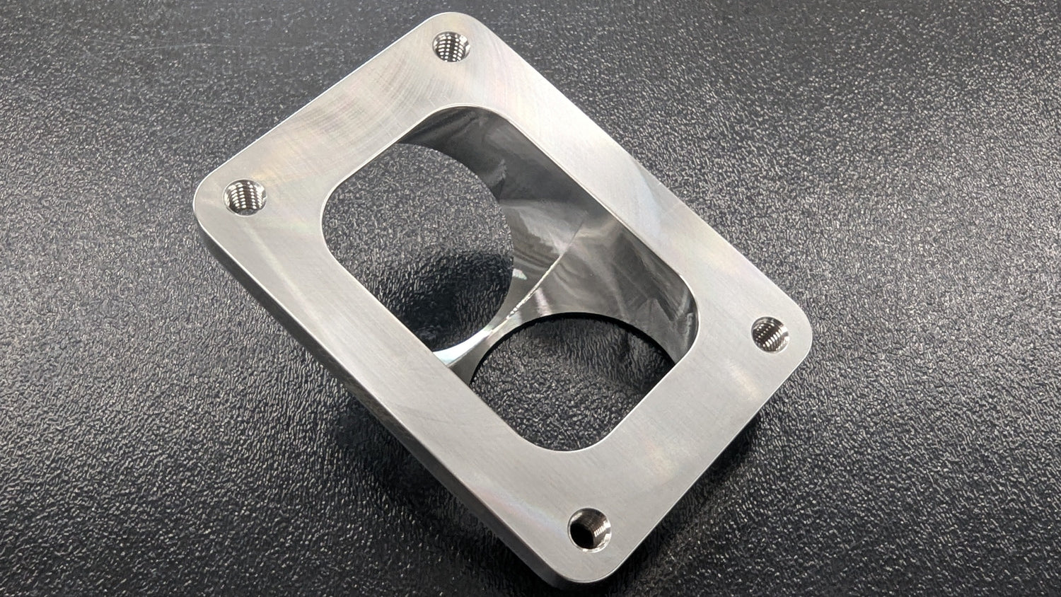 Parker Speed T6 Dual 2.5 inch Open Canted Turbo Flange top view with bolt holes