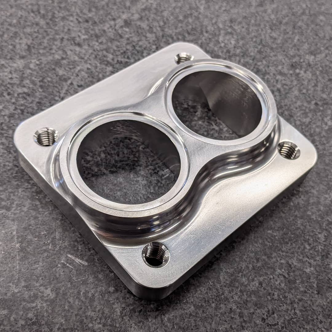 Parker Speed T4 dual 1.5 inch pipe Schedule 40 turbo flange CNC machined stainless steel