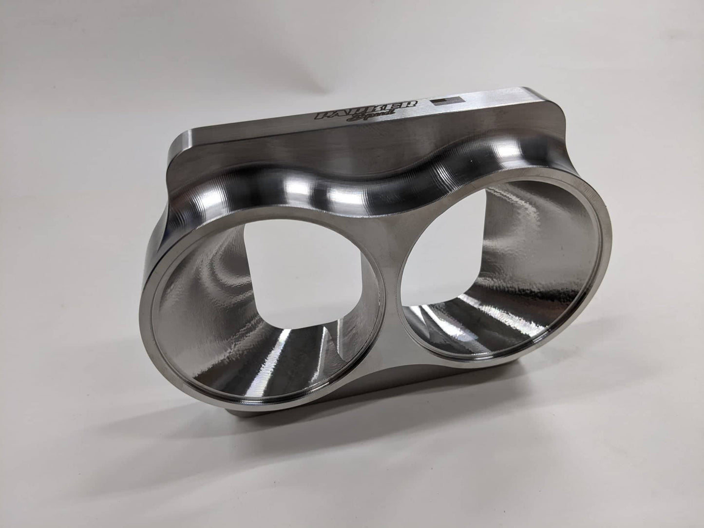 Parker Speed T4 dual 2.5 inch divided turbo flange showing divided exhaust ports and CNC machined finish